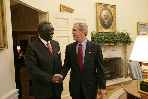 Meeting with the leaders from Mozambique, Botswana, Niger, Ghana and Namibia, President George W. Bush welcomes President John Kufuor of Ghana to the Oval Office Monday, June 13, 2005. The leaders discussed a range of topics, including AGOA. "All the Presidents gathered here represent countries that have held democratic elections in the last year," said President Bush. "What a strong statement that these leaders have made about democracy and the importance of democracy on the continent of Africa." White House photo by Eric Draper