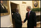 Meeting with the leaders from Mozambique, Botswana, Niger, Ghana and Namibia, President George W. Bush welcomes President Hifikepunye Pohamba of Namibia to the Oval Office Monday, June 13, 2005. The leaders discussed a range of topics, including AGOA. "All the Presidents gathered here represent countries that have held democratic elections in the last year," said President Bush. "What a strong statement that these leaders have made about democracy and the importance of democracy on the continent of Africa." White House photo by Eric Draper