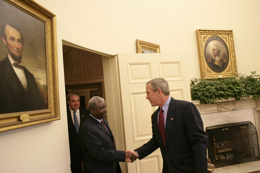 Meeting with the leaders from Mozambique, Botswana, Niger, Ghana and Namibia, President George W. Bush welcomes President Armando Guebuza of Mozambique to the Oval Office Monday, June 13, 2005. The leaders discussed a range of topics, including AGOA. "All the Presidents gathered here represent countries that have held democratic elections in the last year," said President Bush. "What a strong statement that these leaders have made about democracy and the importance of democracy on the continent of Africa." White House photo by Eric Draper