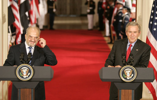 President George W. Bush and Dr. Ibrahim Jaafari, Prime Minister of Iraq, take questions from the media during a joint press conference Friday, June 24, 2005, in the East Room of the White House. White House photo by Paul Morse