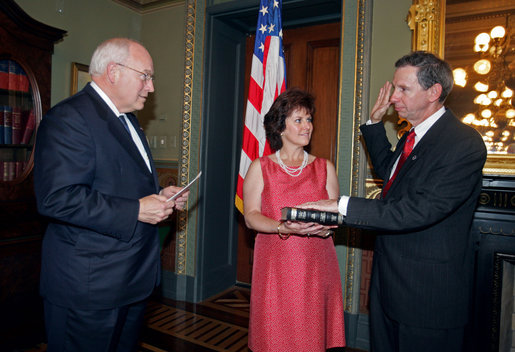 Vice President Dick Cheney swears in NASA Administrator Michael Griffin as his wife, Rebecca Griffin, holds the Bible during a ceremony in the Vice President's Ceremonial Office at the Dwight D. Eisenhower Executive Office Building Tuesday, June 28, 2005. Mr. Griffin is the 11th Administrator of the National Aeronautics and Space Administration. White House photo by David Bohrer