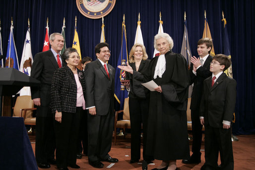 Justice Sandra Day O'Connor introduces Alberto Gonzalez to the audience after administering the oath of office to him during ceremonies welcoming him to his new post of U.S. Attorney General. Justice O’Connor submitted her resignation to President George W. Bush Friday, July 1, 2005, to spend more time with her husband, John O’Connor. File photo. White House photo by Paul Morse
