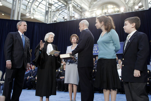 With President George Bush looking on, Supreme Court Justice Sandra Day O’Connor swears in Michael Chertoff as Secretary of Homeland Security during ceremonies March 3, 2005, in Washington. The Justice submitted her resignation after 24 years on the High Court in a letter to the President Friday, July 1, 2005. File photo. White House photo by Paul Morse