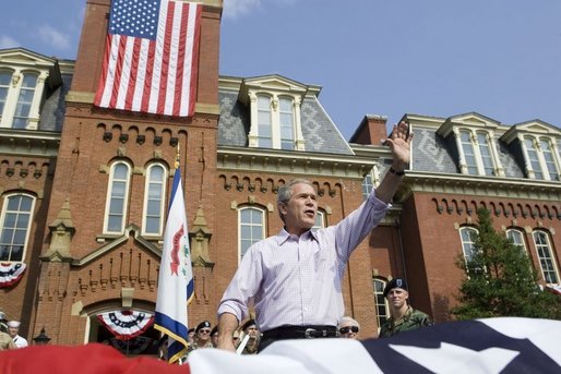 President George W. Bush waves to the estimated 3,000 people in attendance at an Independence Day celebration Monday, July 4, 2005, at West Virginia University in Morgantown. Said the President, "The history we celebrate today is a testament to the power of freedom to lift up a whole nation." White House photo by Krisanne Johnson