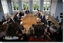 President George W. Bush meets with Danish Prime Minister Anders Fogh Rasmussen, center, left, at his summer residence in Marienborg in Kongens Lyngby, Denmark, Wednesday, July 6, 2005. White House photo by Eric Draper