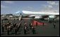 As President George W. Bush and Laura Bush disembarks Air Force One, a band is poised for their arrival at Glasgow's Prestiwick Airport, July 6, 2005. White House photo by Paul Morse