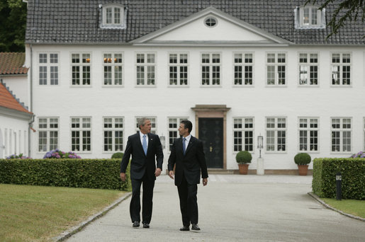 President George W. Bush is greeted by Danish Prime Minister Anders Fogh Rasmussen at his summer residence in Marienborg in Kongens Lyngby, Denmark, Wednesday, July 6, 2005. White House photo by Paul Morse