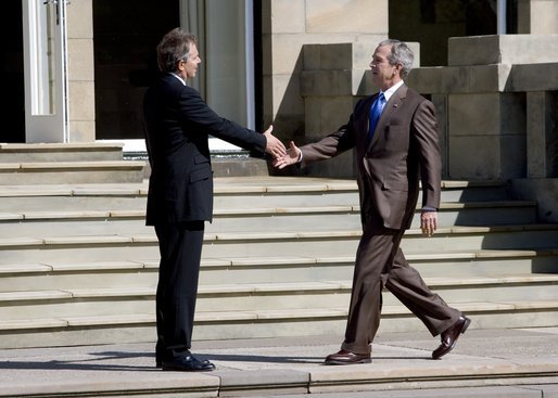 President George W. Bush is welcomed to Gleneagles Hotel in Auchterarder, Scotland, by the United Kingdom's Prime Minister Tony Blair Thursday, July 7, 2005, for the first G8 session. White House photo by Eric Draper