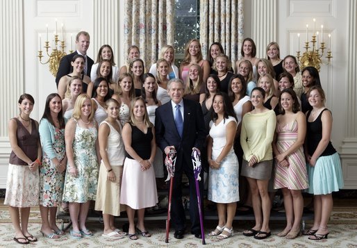 President George W. Bush stands with members of the Northwestern University Women's Lacrosse team during Championship Day Tuesday, July 12, 2005, at the White House. White House photo by David Bohrer