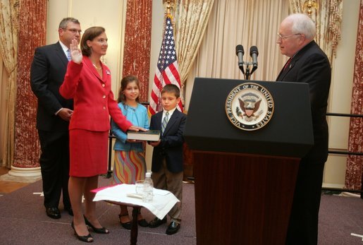 Vice President Dick Cheney swears in Toria Nuland as U.S. Ambassador to the North Atlantic Treaty Organization during a ceremony at the U.S. State Department Wednesday, July 13, 2005. Mrs. Nuland's family participated in the ceremony. White House photo by David Bohrer
