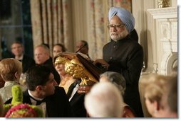 India's Prime Minister Dr. Manmohan Singh addresses guests during dinner in the State Dining Room, Monday evening, July 18, 2005, at the White House.  White House photo by Carolyn Drake