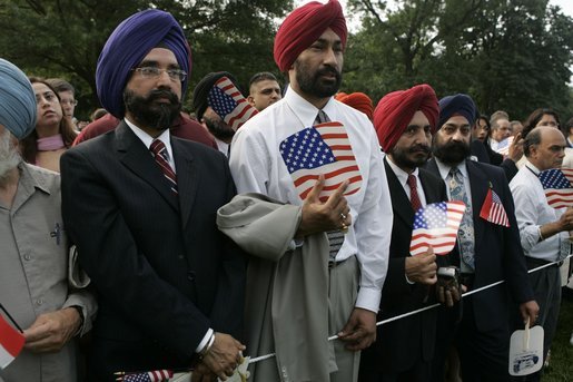 Invited guests are seen at the official arrival ceremony for India's Prime Minister Dr. Manmohan Singh, Monday, July 18, 2005, on the South Lawn of the White House. White House photo by Krisanne Johnson