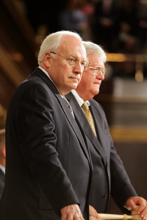 Vice President Dick Cheney and Speaker of the House Dennis Hastert stand to welcome Prime Minister Dr. Manmohan Singh of India before Dr. Singh addresses a Joint Meeting of Congress at the U.S. Capitol Tuesday, July 19, 2005. White House photo by David Bohrer