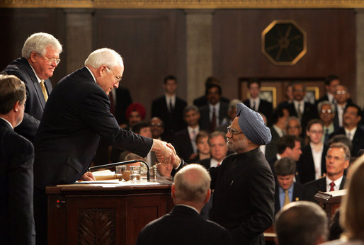 Vice President Dick Cheney shakes hands with Prime Minister Dr. Manmohan Singh of India upon the conclusion of his address to a Joint Meeting of Congress at the U.S. Capitol Tuesday, July 19, 2005. Also pictured at left is Speaker of the House Dennis Hastert. White House photo by David Bohrer