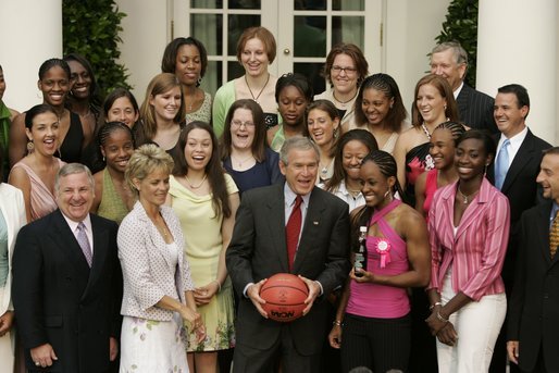 President George W. Bush and members of Baylor University's Lady Bears NCAA basketball team erupt in laughter Wednesday, July 20, 2005, during their Rose Garden visit at the White House. White House photo by Paul Morse