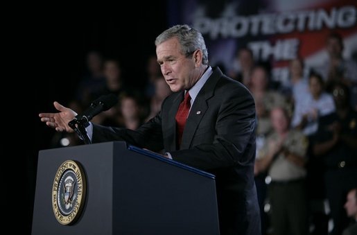 President George W. Bush gestures as he addresses an audience Wednesday, July 20, 2005 at the Port of Baltimore in Baltimore, Md., encouraging the renewal of provisions of the Patriot Act. White House photo by Eric Draper