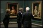 President and Mrs. Bush receive a tour of the Gilbert Stuart Exhibition at the National Gallery of Art, from gallery director Earl " Rusty" Powell III, Monday, July 25, 2005 in Washington. White House photo by Krisanne Johnson