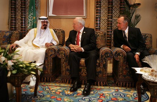 Vice President Dick Cheney and former President George H.W. Bush talk with newly crowned King Abdullah of Saudi Arabia, following the recent death of King Fahd, Friday, August 05, 2005. The vice president led a delegation to pay respects and offer condolences. White House photo by David Bohrer