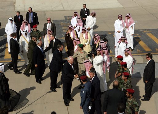 Vice President Dick Cheney, former President George H.W. Bush and former Secretary of State Colin Powell shake hands before their departure back to the United States upon the conclusion of their meeting with King Abdullah following the recent death of King Fahd, Friday, August 05, 2005. Vice President Dick Cheney led a delegation to pay respects following the recent death of King Fahd. White House photo by David Bohrer