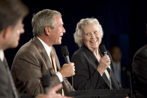 President George W. Bush shares a laugh with Myrtle Jones during a Conversation on Medicare Monday, Aug. 29, 2005, at the James L. Brulte Senior Center in Rancho Cucamonga, Calif. White House photo by Paul Morse