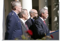 President George W. Bush speaks to the nation during a weekly radio address, live from the Rose Garden at the White House in Washington, D.C., September 3, 2005. Accompanying the president are (L to R) Chairman of the Joint Chiefs of Staff, General Richard Myers, Secretary of Defense Donald Rumsfeld and Homeland Secretary Michael Chertoff.  White House photo by Paul Morse