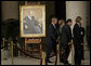 President George W. Bush and Laura Bush walk with Justice Antonin Scalia and Sally Rider, the Chief Justice's assistant, after viewing a portrait of Chief Justice William Rehnquist as his body lies in repose in the Great Hall of the U.S. Supreme Court Tuesday, Sept. 6, 2005. White House photo by Eric Draper