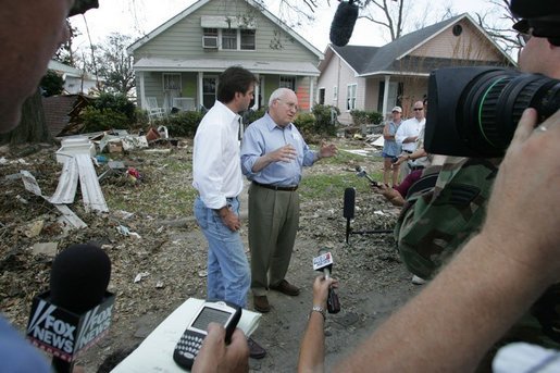 Vice President Dick Cheney walks with Mayor Brent Warr, Thursday, Sept. 8, 2005, through a neighborhood in Gulfport, Miss., devastated by Hurricane Katrina, as they talk with surviving residents. White House photo by David Bohrer