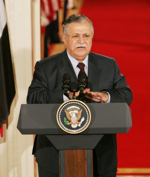 President Jalal Talabani of Iraq, speaks to the media during a joint press availability Tuesday, Sept. 13, 2005, in the East Room of the White House. "It is an honor for me to stand here today as a representative of free Iraq," the President said. "It is an honor to present the world's youngest democracy." White House photo by Shealah Craighead