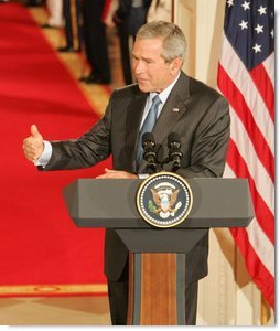 President George W. Bush speaks during an availability Tuesday, Sept. 13, 2005, with Iraq's President Jalal Talabani. Said the President, "It's an honor to welcome the first democratically elected President of Iraq to the White House."  White House photo by Shealah Craighead