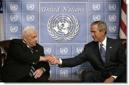 President George W. Bush and Prime Minster Ariel Sharon of Israel greet each other during their meeting at the United Nations in New York, Wednesday, Sept. 14, 2005.  White House photo by Eric Draper