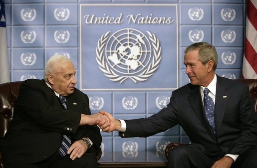President George W. Bush and Prime Minster Ariel Sharon of Israel greet each other during their meeting at the United Nations in New York, Wednesday, Sept. 14, 2005. White House photo by Eric Draper