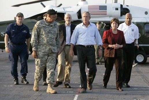 President George W. Bush arrives on the deck of the USS Iwo Jima escorted by General Russel Honore in New Orleans, La., Thursday, Sept. 15, 2005. White House photo by Eric Draper