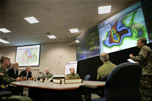 President George W. Bush receives a briefing on Hurricane Rita Friday, Sept. 23, 2005 inside NORAD's U.S. Northern Command at Peterson Air Force Base in Colorado Springs, Colorado. White House photo by Eric Draper