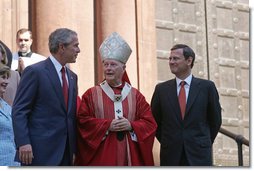 President George Bush walks out of St. Matthew's Cathedral with Theodore Cardinal McCarrick and Supreme Court Chief Justice John Roberts after attending the 52nd Annual Red Mass in Washington, DC, Sunday, October 2, 2005. The Red Mass, a historical tradition within the Catholic Church, is held on the Sunday before the opening session of the Supreme Court.  White House photo by Shealah Craighead