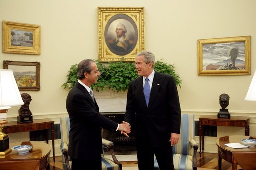 President George W. Bush welcomes Dr. Lawrence Gonzi, Prime Minister of Malta, to the Oval Office Monday, Oct. 3, 2005. White House photo by Paul Morse