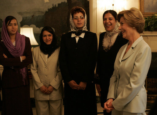 Laura Bush meets with a group of Afghan teachers Wednesday, Oct. 5, 2005, who are training at the University of Nebraska in Omaha on an educational exchange sponsored by the U.S. Department of State's Bureau of Educational and Cultural Affairs and the U.S.-Afghan Women's Council. White House photo by Krisanne Johnson
