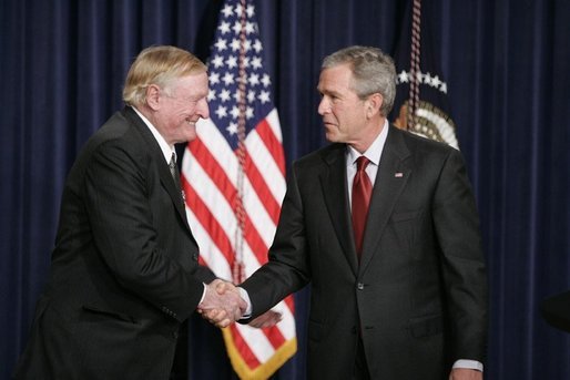President George W. Bush shakes hands with William F. Buckley, Jr., Thursday, Oct. 6, 2005 at the Eisenhower Executive Office Building in Washington, to honor the 50th anniversary of National Review magazine, which was founded by Buckley, and to recognize Buckley's upcoming 80th birthday. White House photo by Paul Morse