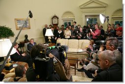 The media gathers around President George W. Bush and Prime Minister Ferenc Gyurcsany of Hungary during their photo opportunity in the Oval Office Friday, Oct. 7, 2005. White House photo by Paul Morse