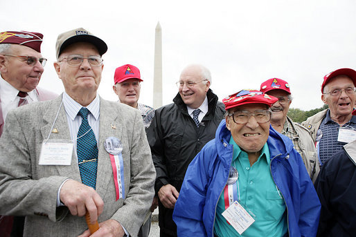 Vice President Dick Cheney poses for a photo with veterans from the 526th Armored Infantry Battalion Friday, Oct. 7, 2005, after delivering remarks during a wreath -laying ceremony at the National World War II Memorial in Washington D.C. "I count it a privilege to stand in the presence of men who were sent into battle by President Franklin D. Roosevelt.and who, by your courage and honor and devotion to duty, helped to win a war and change the course of history", said the Vice President to the soldiers, widows, and family members of the 526th Armored Infantry Battalion who attended the ceremony. The 526th AIB is the sole remaining, separate armored infantry battalion from World War II, whose soldiers defended the Belgian villages of Stavelot and Malmedy on December 16, 1944, the first day of the Battle of the Bulge. White House photo by David Bohrer
