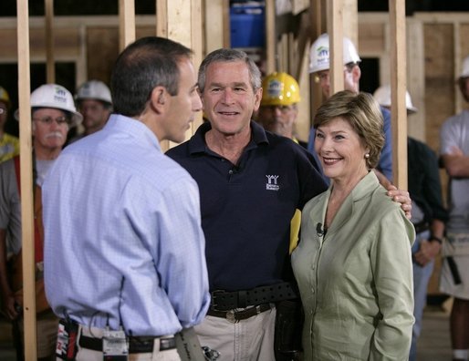 NBC "Today Show" host Matt Lauer talks with President George W. Bush and Laura Bush Tuesday, Oct. 11, 2005, on the construction site of a Habitat for Humanity home in Covington, La., a hurricane-devastated town just north of New Orleans where the nonprofit is building houses for those displaced by Katrina. White House photo by Eric Draper