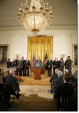 President George W. Bush addresses an audience of legislators, cabinet members and law enforcement officials, Tuesday, Oct. 18, 2005 in the East Room of the White House, prior to signing the Homeland Security Appropriations Act for fiscal year 2006.  White House photo by Paul Morse