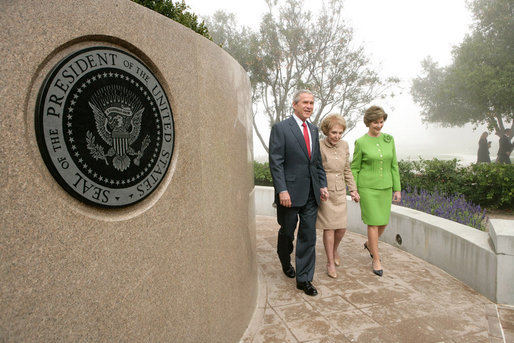 President George W. Bush, Nancy Reagan and Laura Bush tour the grounds of the Ronald Reagan Presidential Library in Simi Valley, Calif., where they attended ceremonies, Friday, Oct. 21, 2005 for the opening of the Air Force One Pavilion. White House photo by Eric Draper