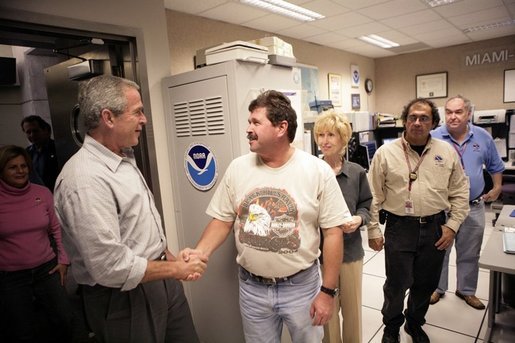 President George W. Bush visits the offices of the National Hurricane Center, Thursday, Oct. 27, 2005, in Miami, Fla. White House photo by Eric Draper