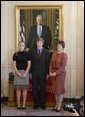 The family of Judge Samuel A. Alito, Jr., look on Monday, Oct. 31, 2005, as their father is nominated by President George W. Bush for Associate Justice of the U.S. Supreme Court. From left: daughter Laura, son, Phil, and wife, Martha. White House photo by Paul Morse