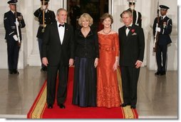 President George W. Bush and Laura Bush welcome the Prince of Wales and Duchess of Cornwall upon their arrival to the White House, Wednesday evening, Nov. 2, 2005.  White House photo by Paul Morse