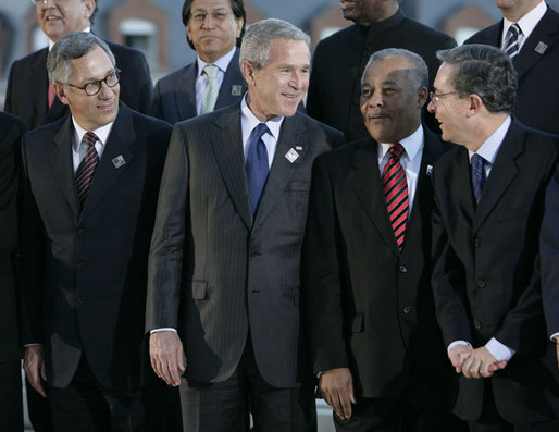 President George W. Bush is joined by leaders of the Americas Friday, Nov. 4, 2005, during the 2005 Summit of the Americas class photo in Mar del Plata, Argentina. Joining him in the front row are, from left: President Eduardo Rodriguez of Bolivia; Prime Minister Owen Arthur of Barbados; and Colombia President Alvaro Uribe. White House photo by Eric Draper