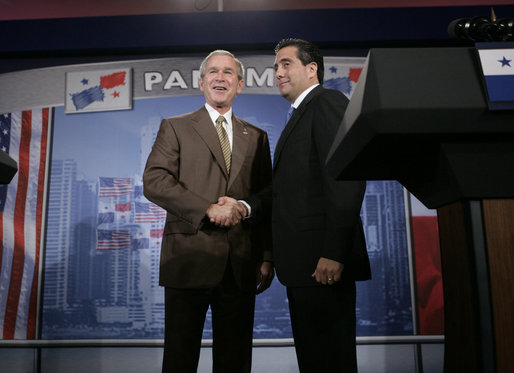 President George W. Bush greets President Martin Torrijos of Panama at the end of a joint press availability with the at Casa Amarilla in Panama City, Panama, Monday, Nov. 7, 2005. White House photo by Eric Draper