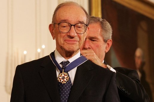 President George W. Bush presents the Presidential Medal of Freedom to Federal Reserve Chairman Alan Greenspan, one of 14 recipients of the 2005 Presidential Medal of Freedom, awarded Wednesday, Nov. 9, 2005 in the East Room of the White House. White House photo by Shealah Craighead