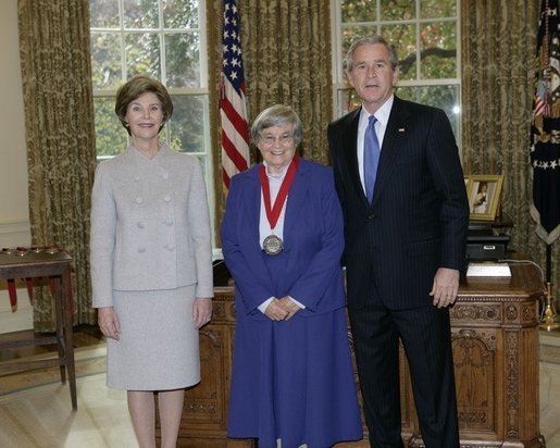 President George W. Bush and Laura Bush stand with 2005 National Humanities Medal recipient Eva Brann, professor at St. John's College, Thursday, Nov. 10, 2005 in the Oval Office at the White House. White House photo by Eric Draper