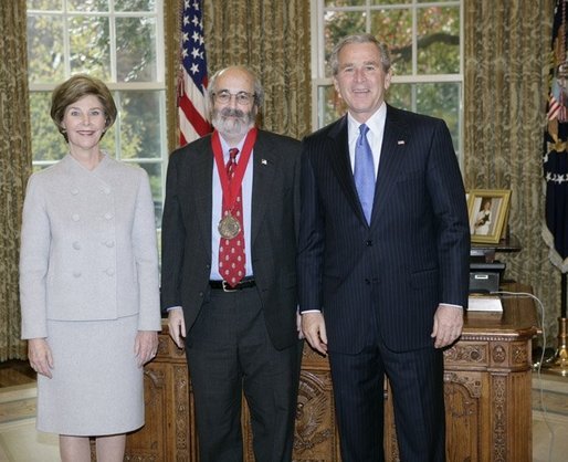 President George W. Bush and Laura Bush stand with 2005 National Humanities Medal recipient Alan Kors, historian, Thursday, Nov. 10, 2005 in the Oval Office at the White House. White House photo by Eric Draper